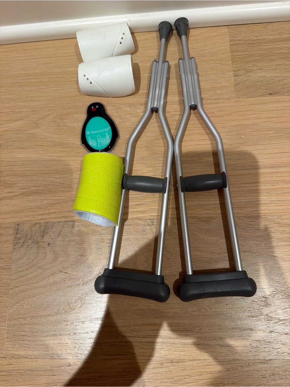 American Girl Silver Crutches with Black Handles and Neon Yellow Wrap
